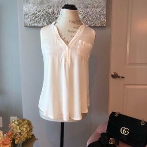 White sleeveless blouse